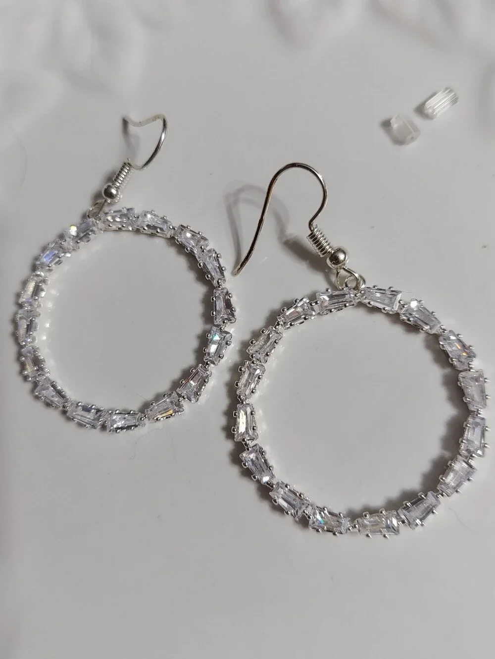 Polished Silver Tone/Faceted Cut Crystal (East-West) Design Hoop Earrings